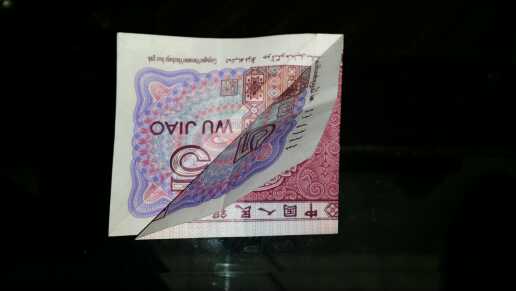 纸币人民币折纸，教你用五角纸币折叠可爱的小青蛙的手工折纸方法