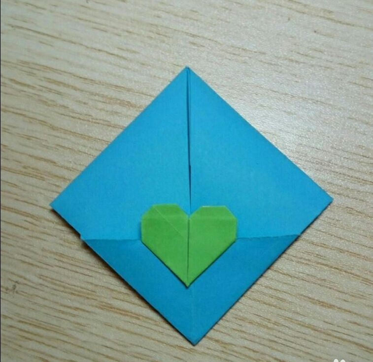 手工折纸制作花式爱心信封，一款带爱心的情书的折纸方法，爱心情书的折法。